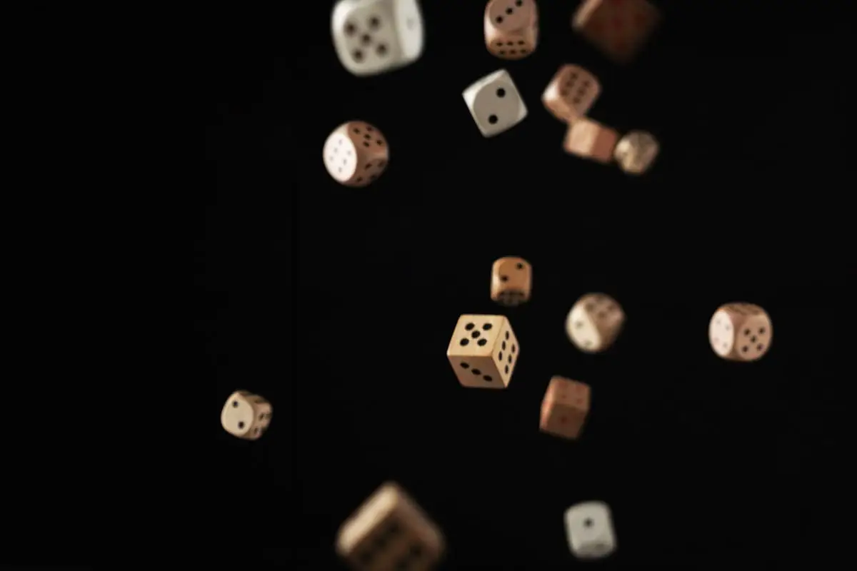 Dice in motion above a gaming table